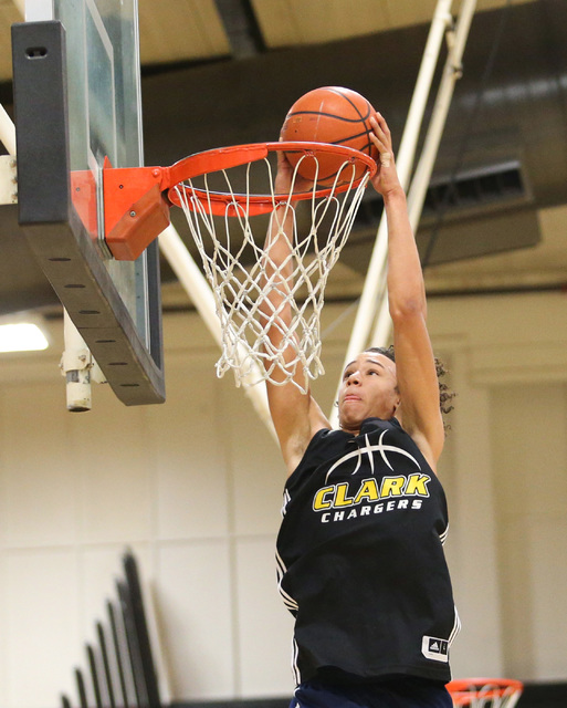 Clark forward Ian Alexander dunks the ball during practice at Ed W. Clark High School in Las ...