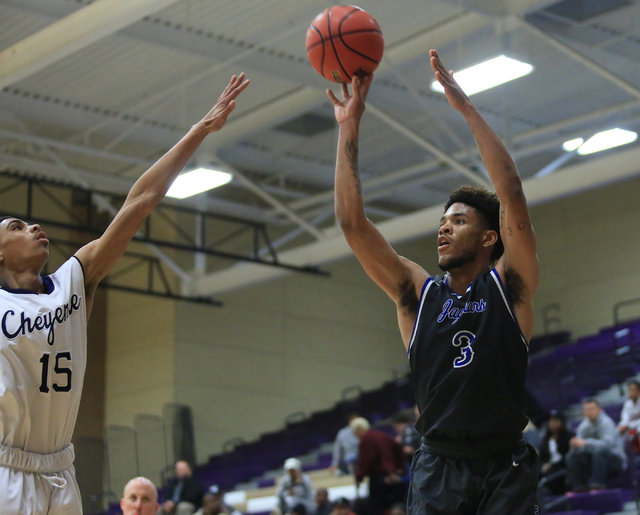 Desert Pines senior Trevon Abdullah (3) takes a shot during the Class 3A boys regional baske ...