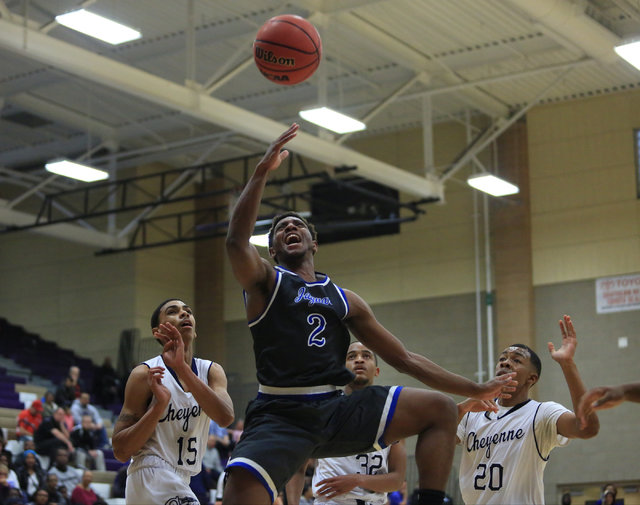 Desert Pines senior Jordan Simon (2) takes a shot during the Class 3A boys regional basketba ...