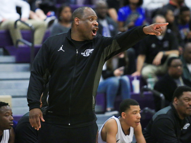 Cheyenne High School head coach Teral Fair shouts to a player during the Class 3A boys regio ...