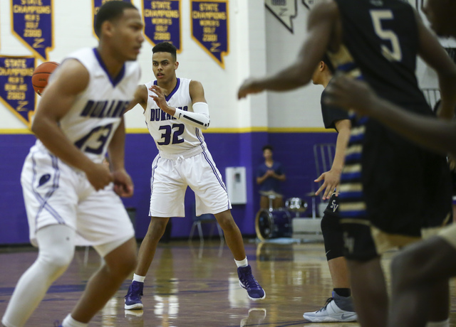 Durango forward Jeremie Portuondo (32) makes a pass during a basketball game against Sierra ...