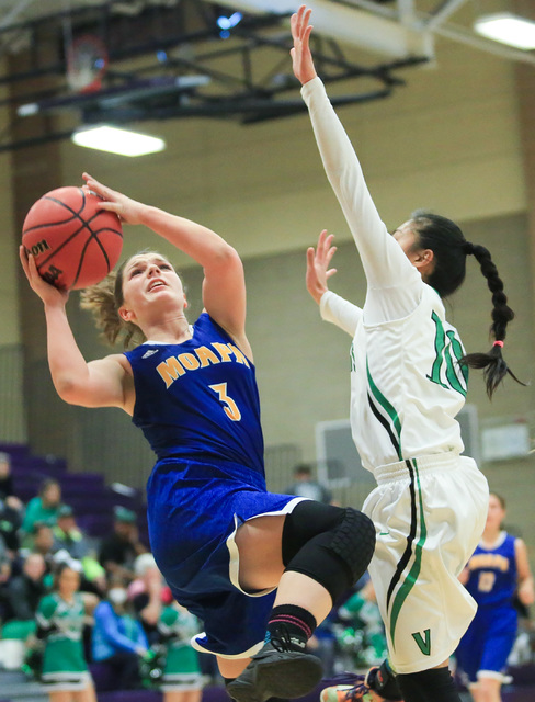 Moapa Valley sophomore Lainey Cornwall (3) shoots the ball during the Class 1A girls regiona ...