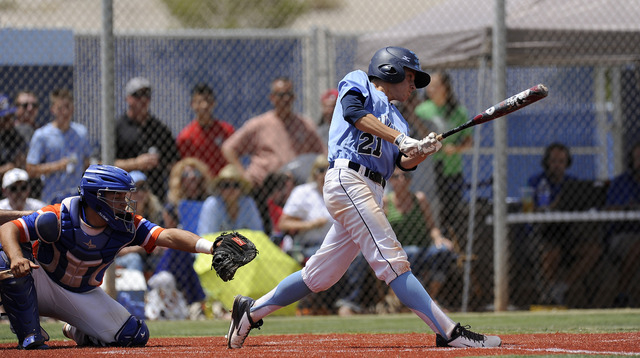 Centennial pitcher Cooper Powell hits an RBI single in the first inning against the Bishop G ...