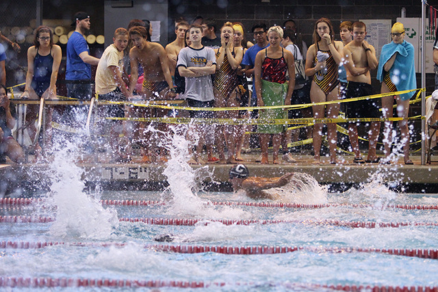 Swimmers cheer on their teammates during the Sunrise and Sunset Region swimming finals Satur ...