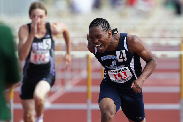 Canyon Springs hurdler Bradley Alexander wins the boys 110-meter hurdles during the Sunrise ...