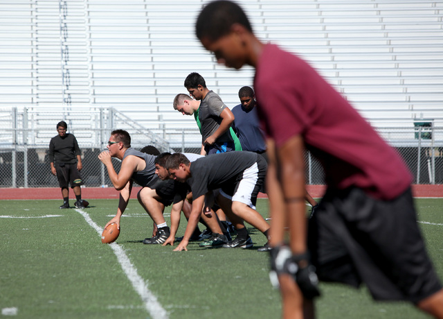 Rancho center Jakob Mitchell, prepares to snap the ball during practice on Thursday. The tea ...