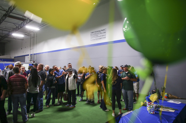 People arrive to watch as Las Vegas area high school softball players gather to sign their n ...