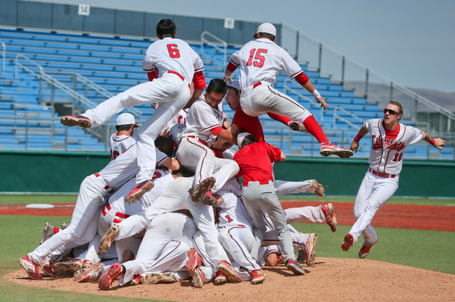 The Liberty Patriots celebrate after defeating Centennial 5-3 for the Division I state title ...