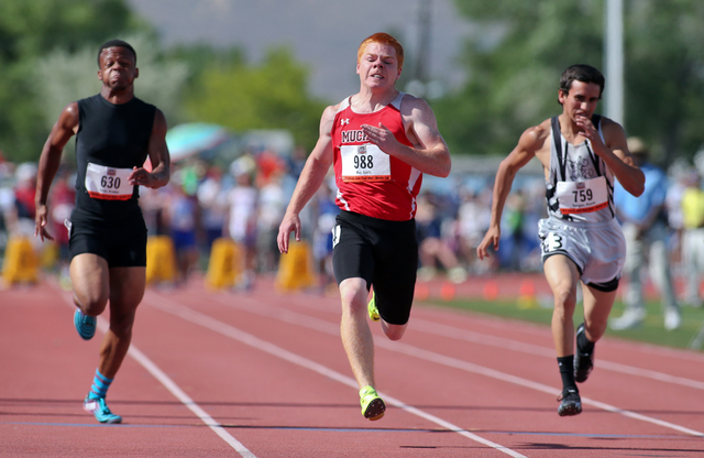 Tonopah’s Scotty May, center, wins the Division IV boys 100-meter dash with a time of ...