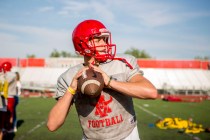 Arbor View High School quarterback Hayden Bollinger prepares to pass the ball during footbal ...