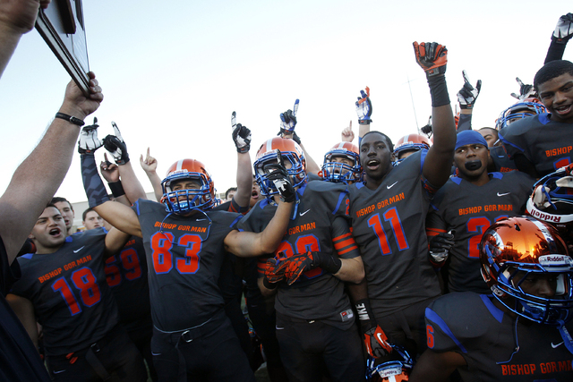 Bishop Gorman players celebrate after defeating Palo Verde 45-7 in the Sunset Region champio ...