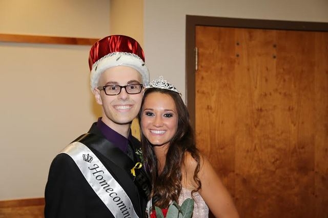 Homecoming King Michael Tatalovich, a cancer survivor, poses with Homecoming Queen Logan Luc ...