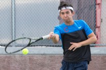 Wesley Harris from Coronado High School hits a shot during a tennis match at Liberty High Sc ...
