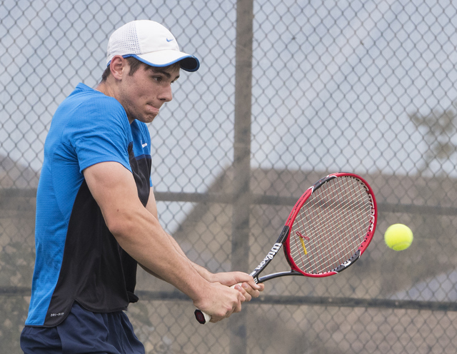 Martin Rizov from Coronado High School hits a shot during a tennis match at Liberty High Sch ...