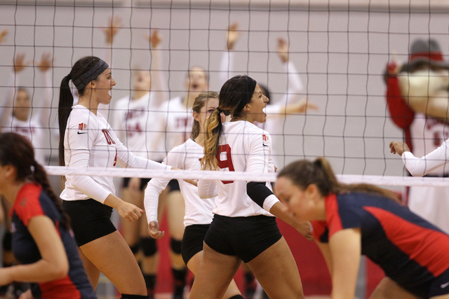 Bree Hammel (9), Alexis Patterson (4) and the rest of the UNLV women’s volleyball team ...