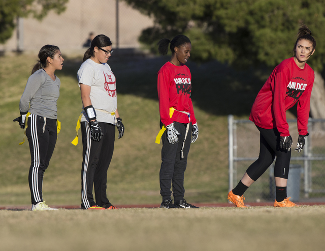 Wildcat wide receiver Natalie Gennuso, right, gets ready to run a route during flag football ...