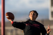Wildcat quarterback Sabrina Saldate runs drills during flag football practice at Las Vegas H ...