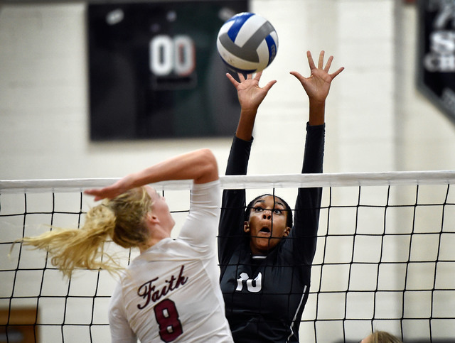 Palo Verde’s Jacquelyn Fields (10) goes up to block a shot by Faith Lutheran’s B ...