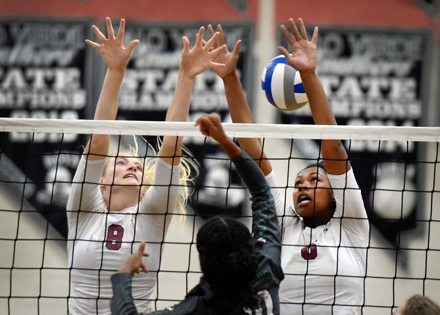 Faith Lutheran’s Bryanna Neagle (8) and Sydney Washington miss blocking a shot by Palo ...