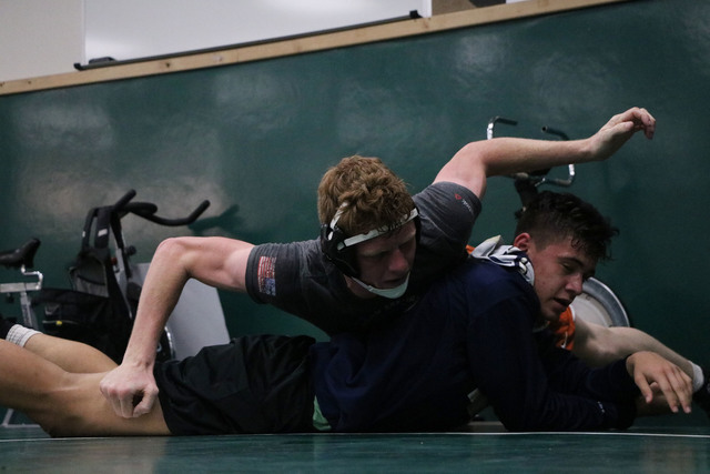 Virgin Valley wrestler Cache Burnside, top, performs a take down on Timmy Moeai at practice, ...