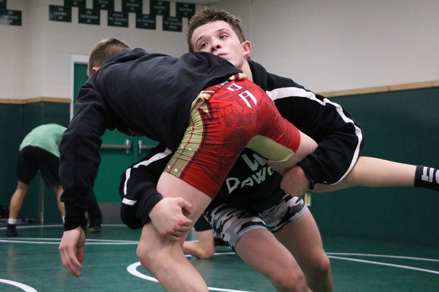 Virgin Valley wrestler Jacob Baird, right, takes down Ty Smith at practice, Virgin Valley Hi ...