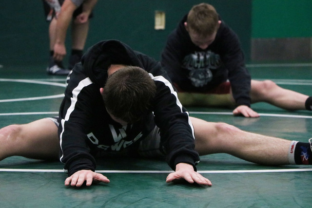 Virgin Valley wrestler Jacob Baird, front, leads stretch in front of Ty Smith at practice, V ...