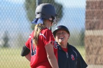 Coronado head coach Melissa Krueger, right, laughs while speaking with pitcher Sarah Pinksto ...