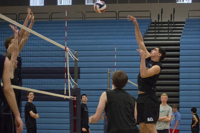 Tyler Jacob (15) hits the ball during volleyball practice at Foothill High School in Henders ...