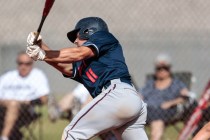 Liberty High School senior Preston Pavlica (11) swings at the ball during a baseball game at ...