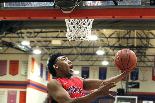 Findlay Prep guard Allonzo Trier (4) goes up for a shot against Wasatch Academy in the first ...