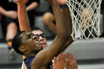 Agassi Prep’s Deishuan Booker shoots against Rancho on Monday. Booker scored 14 of his ...