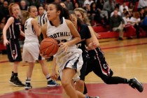 Foothill junior Katey Roquemore (22) drives to the hoop on Thursday. Roquemore had 13 points ...