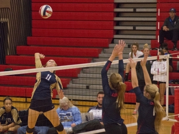Whitley Brow goes up for a kill. She is one of 10 returning letter winners for Foothill. (Da ...
