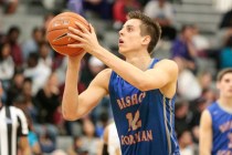 Bishop Gorman senior Zach Collins (12) shoots from the free-throw line during a prep basketb ...