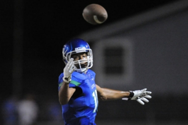 Green Valley wide receiver Isiah Macklin is unable to come up with the catch against Arbor V ...
