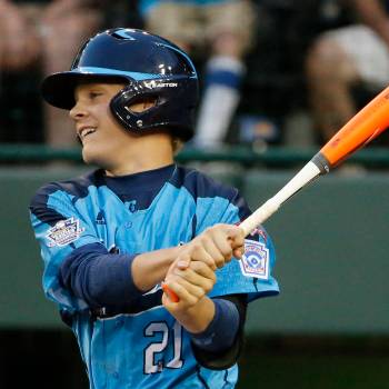 Las Vegas' Austin Kryszczuk (21) drives in a run with a triple off Philadelphia pitcher Mo'ne D ...