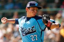 Las Vegas pitcher Brennan Holligan (27) delivers during the first inning of a baseball game aga ...