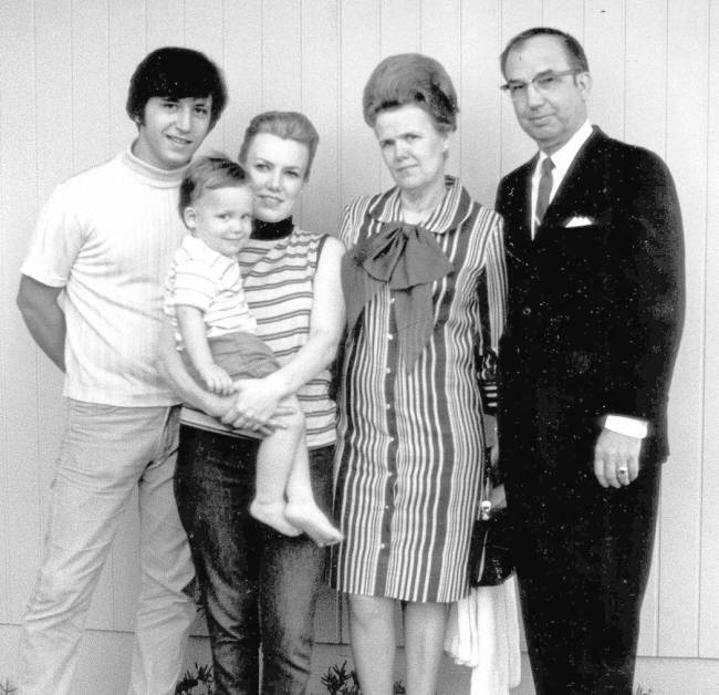 A 1968 photo shows Jay Sebring, left, alongside his sister, Peggy DiMaria, holding her son Anth ...