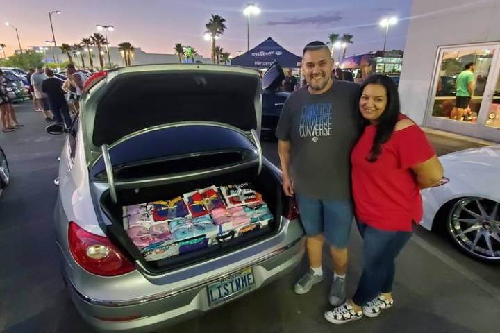 Miguel and Stephanie Landrove made a large donation of pajamas at Findlay Volkswagen in the Val ...