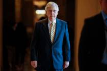 Senate Majority Leader Mitch McConnell, R-Ky., walks to the Senate chamber for votes on federal ...