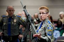 FILE - In this Jan. 28, 2013, file photo, firearms training unit Detective Barbara J. Mattson, ...