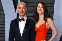FILE - In this March 4, 2018 file photo, Jeff Bezos and wife MacKenzie Bezos arrive at the Vani ...
