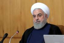 In this photo released by the office of the Iranian Presidency, President Hassan Rouhani speaks ...
