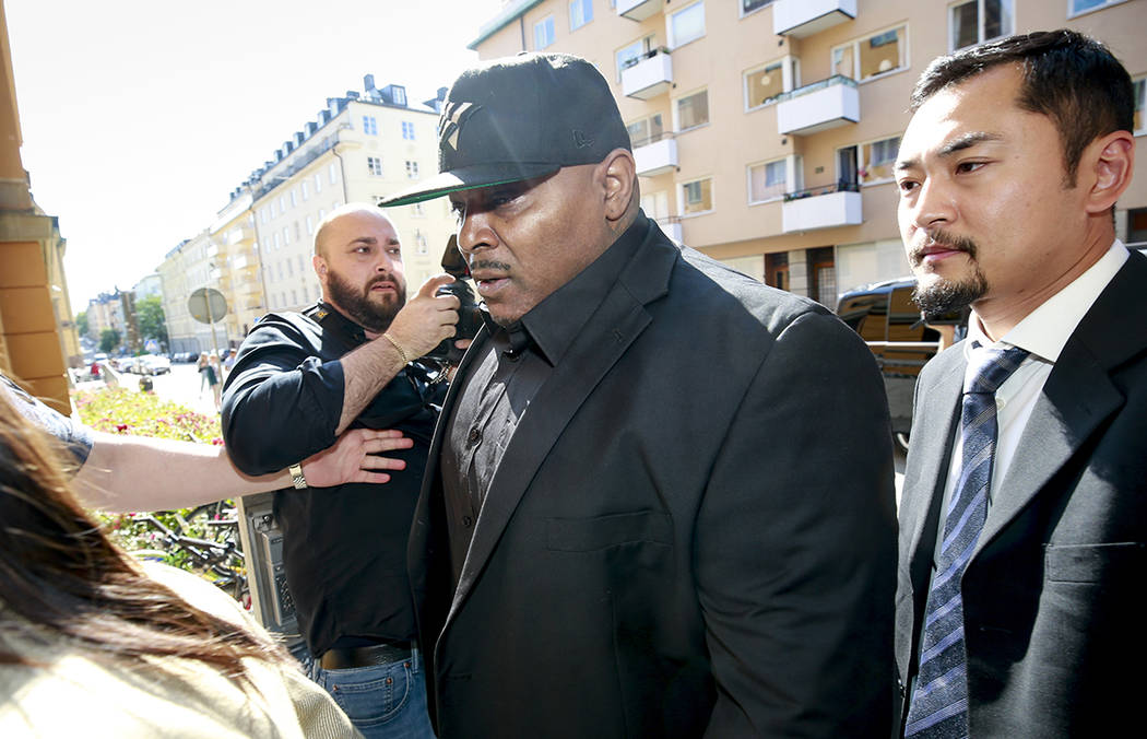 One of A$AP Rocky's bodyguards arrives at the district court in Stockholm, Friday Aug. 2, 2019, ...