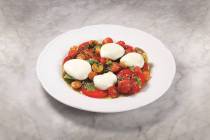 The caprese salad from Carbone is one way to stay cool while eating this summer. (MGM Resorts I ...