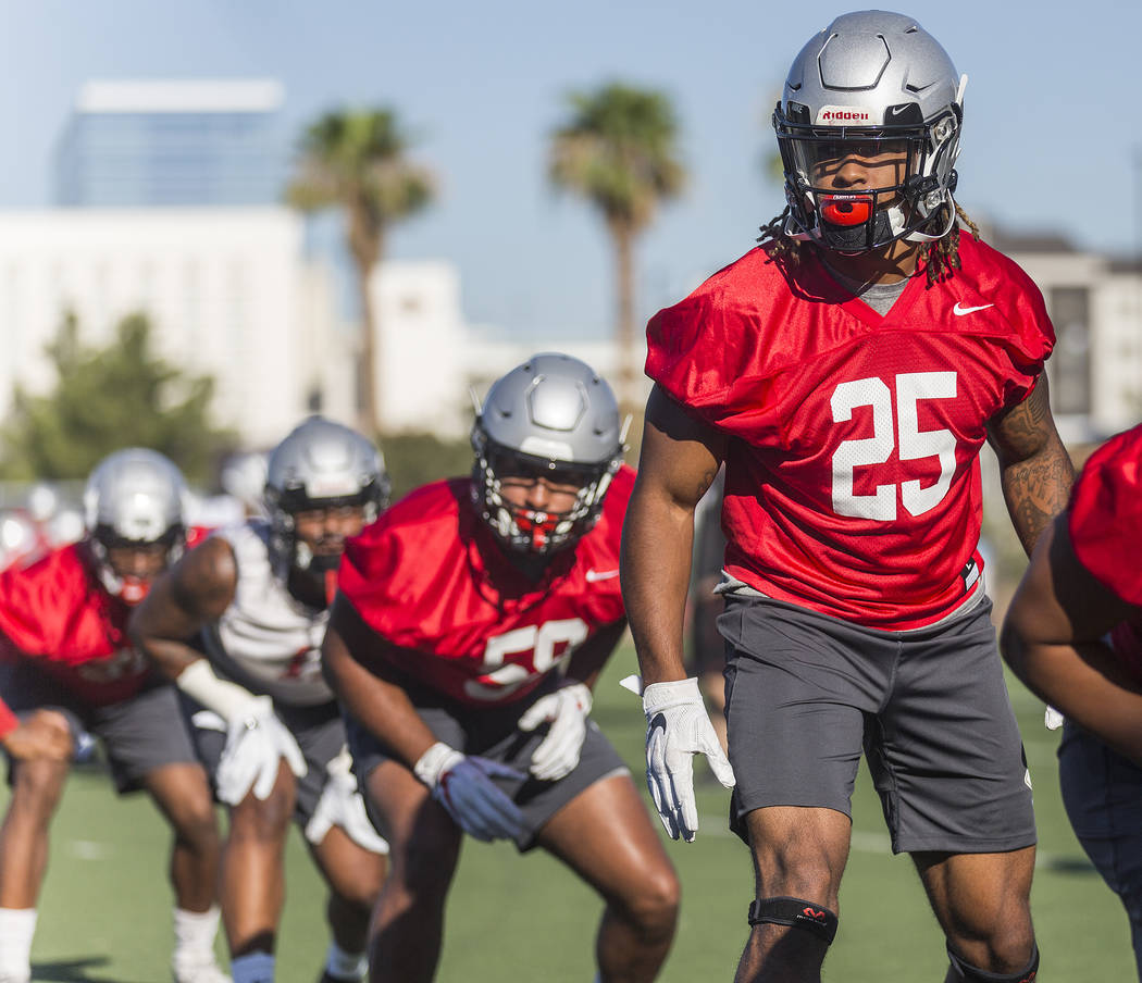 UNLV defensive end/linebacker Gabe McCoy (25) works through drills during the first day of trai ...