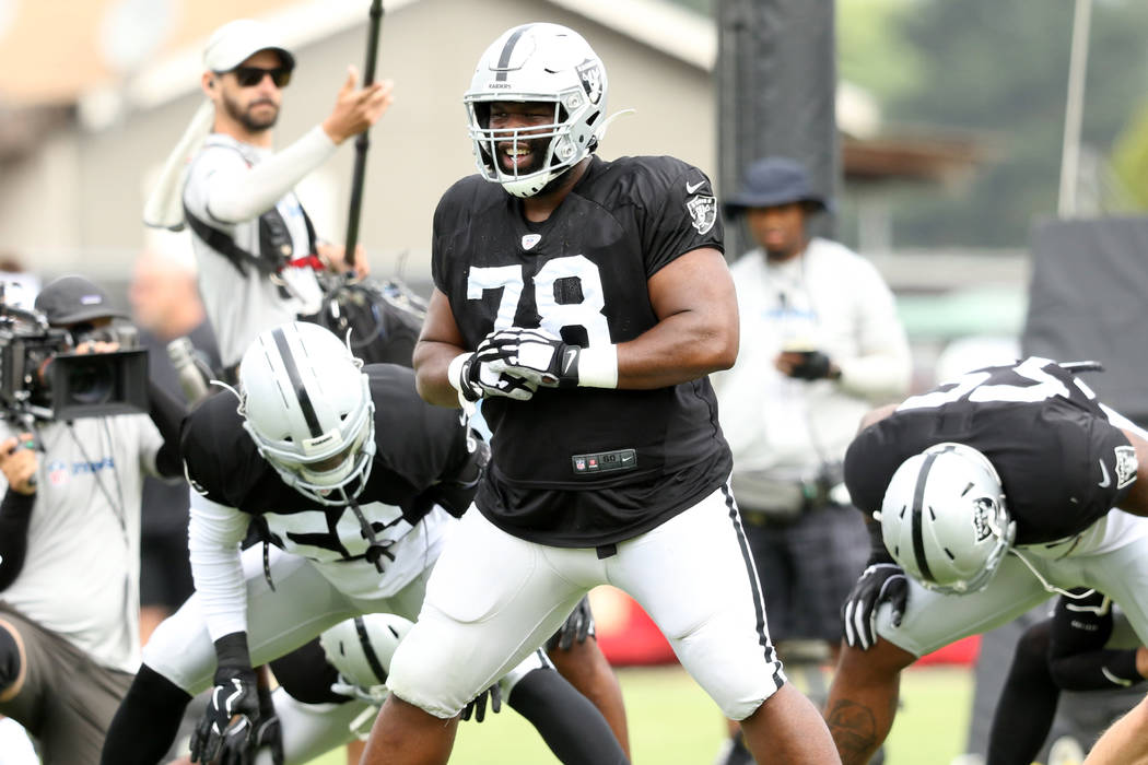 Oakland Raiders defensive tackle Justin Ellis (78) warms up during the NFL team's training camp ...