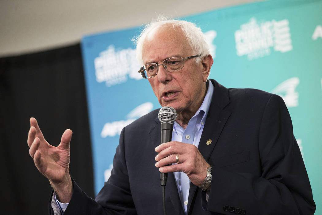 Sen. Bernie Sanders, I-Vt., talks with members of the news media after speaking at a public for ...