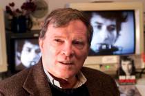 In this Jan. 27, 2000 file photo, documentary filmmaker D.A. Pennebaker is flanked by 35-year-o ...