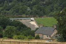 A view of the damaged Toddbrook Reservoir near the village of Whaley Bridge,in Derbyshire, Engl ...